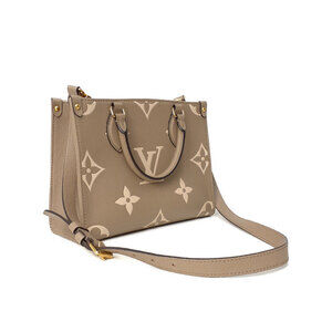 Louis Vuitton Empreinte Monogram the Go Bicolor Bag On